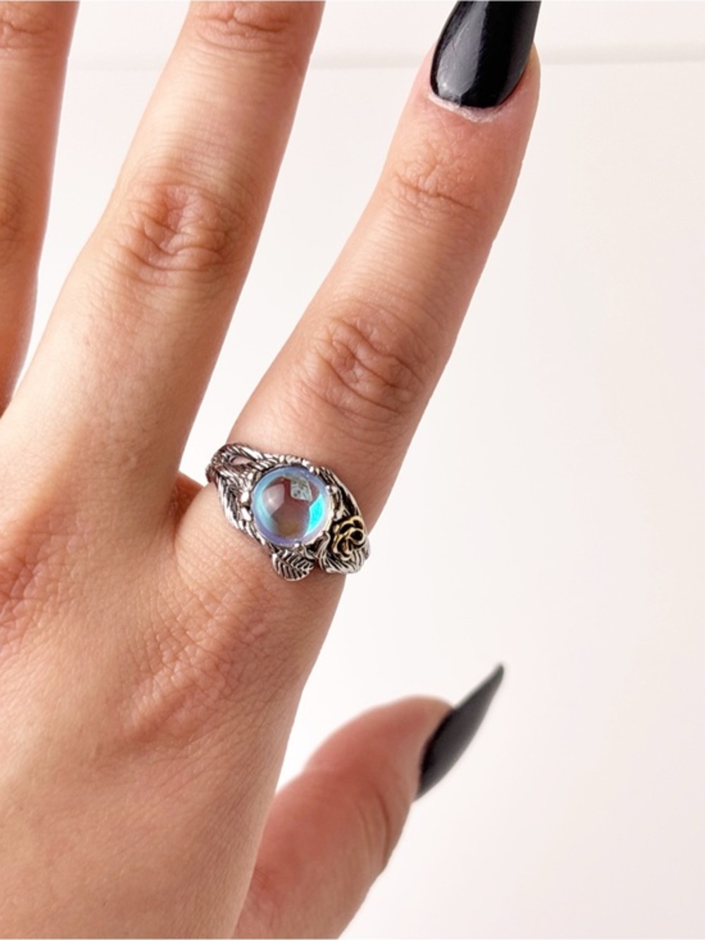 Sterling Silver Flower and Leaf Motif Moonstone Ring in Iridescent Blue
